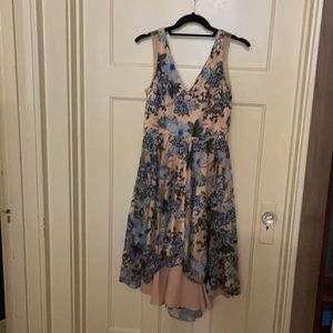 Sequined. ‘Belle  BADGLEY MISCHKA’ dress. 
Just above the knee.